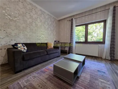 Apartament central cu acces la gradina si 2 locuri parcare - foto 5