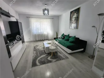 De inchiriat apartament modern la etajul 1 cu 2 camere decomandate, balcon si loc de parcare privat in Sibiu - Sibiu