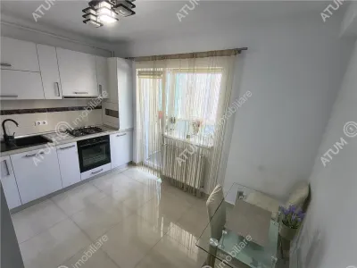 De inchiriat apartament modern la etajul 1 cu 2 camere decomandate, balcon si loc de parcare privat in Sibiu - foto 15