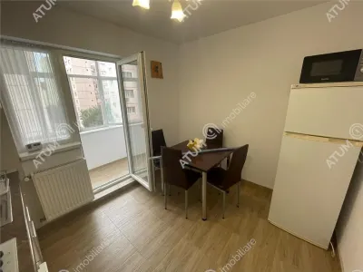 De inchiriat apartament cu 3 camere decomandate si balcon in zona Vasile Aaron din Sibiu - foto 11