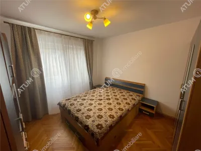 De inchiriat apartament cu 3 camere decomandate si balcon in zona Vasile Aaron din Sibiu - foto 6