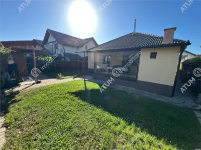 De vanzare casa cu 3 camere pivnita si pod amplasata pe teren de 438 mp zona Calea Cisnadiei din Sibiu - foto 13