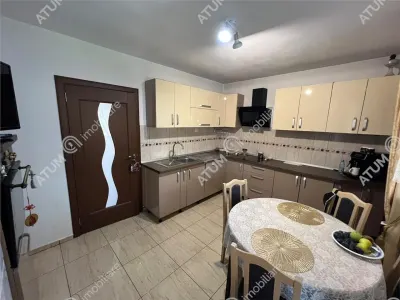De vanzare casa cu 3 camere pivnita si pod amplasata pe teren de 438 mp zona Calea Cisnadiei din Sibiu - foto 8