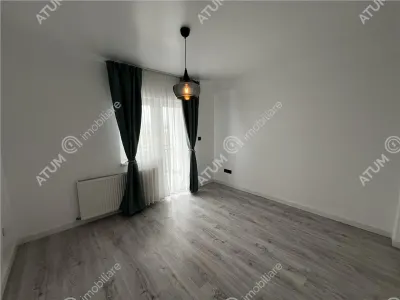 Apartament modern cu 3 camere si 2 balcoane etaj 2 zona Brana din Selimbar - foto 16
