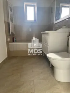 4 camere cu garaj sub bloc la etaj 3 - foto 3